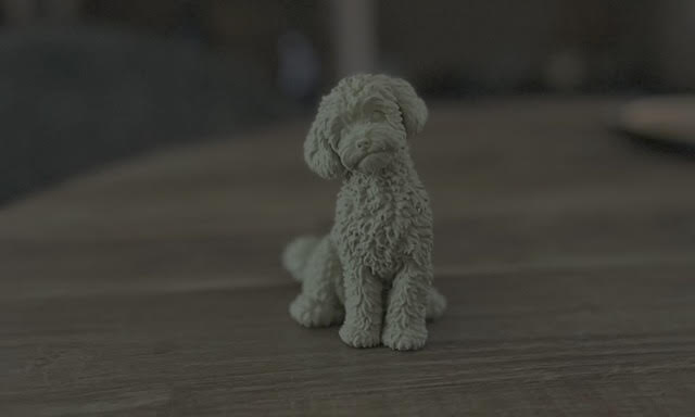 3D-geprint hondje Buddy op een houten ondergrond